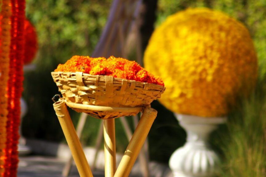 Basket of marigold flowers prepared for a wedding season celebration
