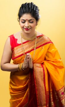 Woman dressed in a festive silk saree celebrating Dussehra